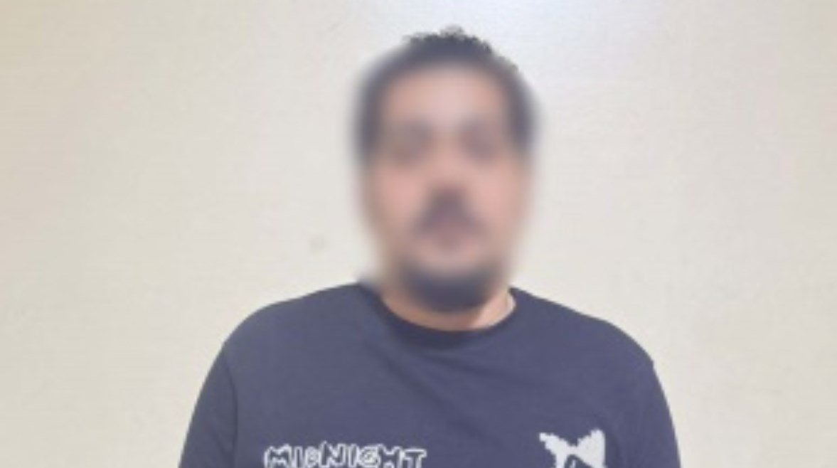 المتهم بعد ضبطه المتهم بعد ضبطه